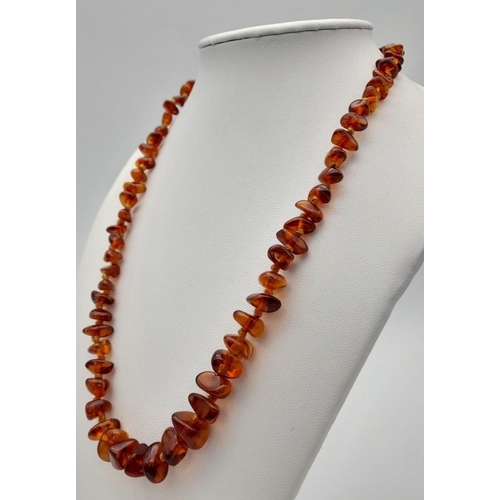 497 - Vintage AMBER NECKLACE with 9 CARAT GOLD CLASP.Consisting various shapes of polished  Amber individu... 