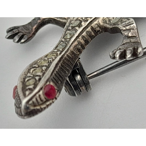 553 - Vintage SILVER MARCASITE SALAMANDER BROOCH.Finished in 925 Silver and set with Ruby eyes. 5.5 cm.