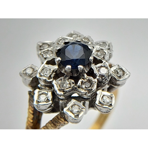 56 - A Magnificent SAPPHIRE and DIAMOND RING. Set in hallmarked 18 CARAT GOLD. Having a quality round cut... 