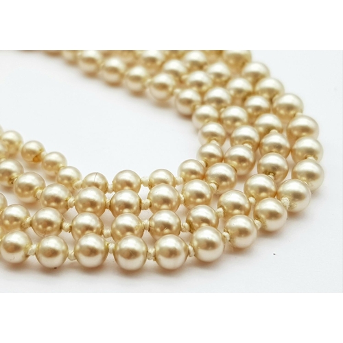 567 - Nice quality PEARL NECKLACE consisting two rows of graduated PEARLS individually knotted and closing... 