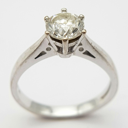 71 - An 18K White Gold Diamond Solitaire Ring. Brilliant round cut diamond - 1ct. Size - N. 4.4g total we... 