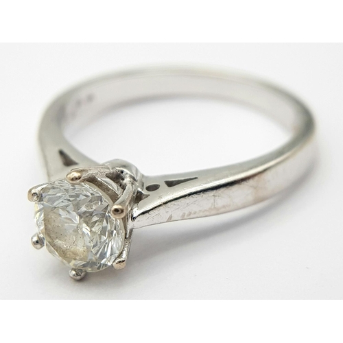 71 - An 18K White Gold Diamond Solitaire Ring. Brilliant round cut diamond - 1ct. Size - N. 4.4g total we... 