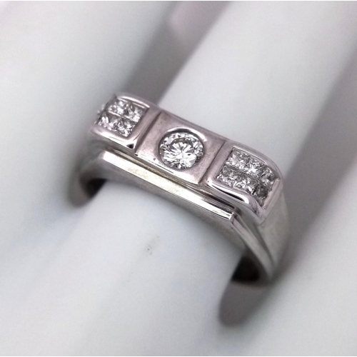 88 - A 18K WHITE GOLD DIAMOND SET THREE STONE RING 0.50CT , 5.9G , SIZE V.

ref: 6104