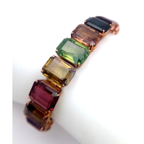 89 - A FABULOUS VINTAGE MULTI GEMSTONE 14K GOLD BRACELET .   21gms  IN ORIGINAL BOX .