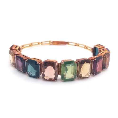 89 - A FABULOUS VINTAGE MULTI GEMSTONE 14K GOLD BRACELET .   21gms  IN ORIGINAL BOX .