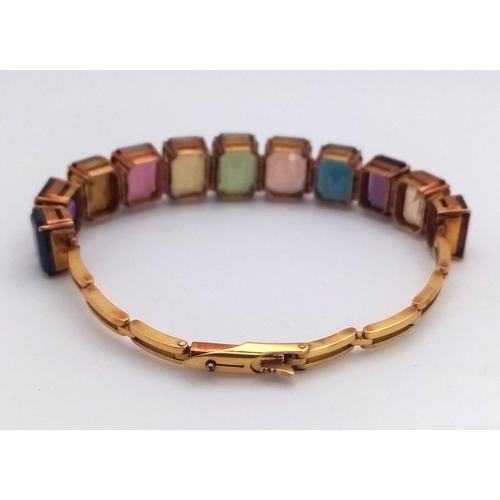 89 - A FABULOUS VINTAGE MULTI GEMSTONE 14K GOLD BRACELET .   21gms  IN ORIGINAL BOX .