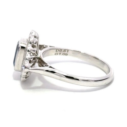 93 - 18ct white gold TANZANITE and DIAMOND ring, 1.09ct emerald cut Tanzanite centre stone surrounded by ... 