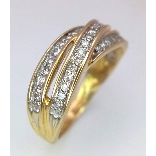 107 - A 18K YELLOW GOLD DIAMOND CROSSOVER RING 0.40CT 4.7G SIZE N.

ref: SC 2054