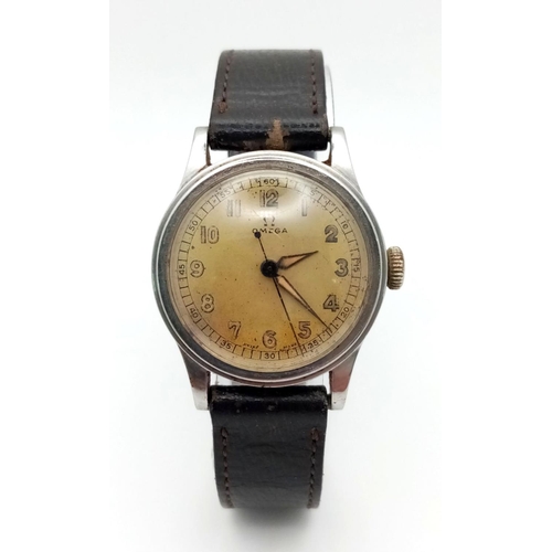 148 - A Vintage Omega Mechanical (hand-wind) Gents Watch. Brown leather strap. Stainless steel case - 31mm... 