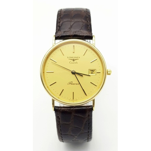 162 - A Longine 9K Yellow Gold Cased Quartz Gents Watch. Brown leather strap. 9K gold case - 32mm. Gold to... 