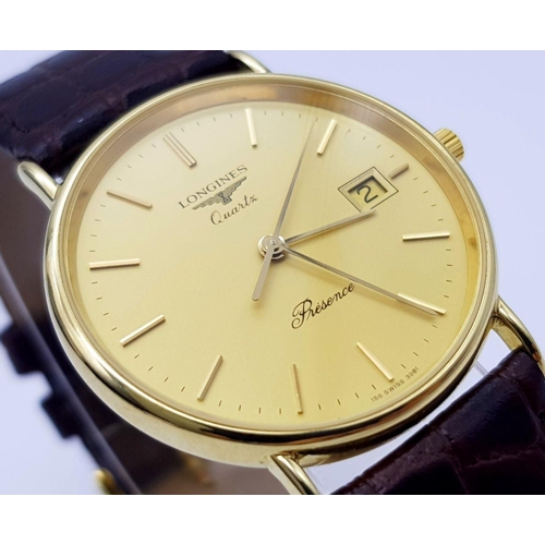 162 - A Longine 9K Yellow Gold Cased Quartz Gents Watch. Brown leather strap. 9K gold case - 32mm. Gold to... 