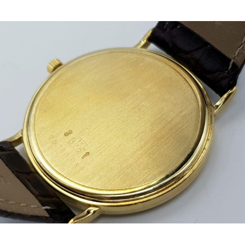 162 - A Longine 9K Yellow Gold Cased Quartz Gents Watch. Brown leather strap. 9K gold case - 32mm. Gold to... 