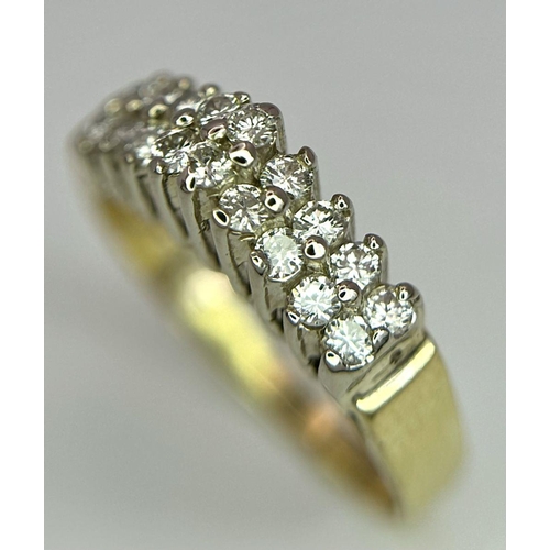 186 - A 18K YELLOW GOLD DIAMOND TWO ROW STEP RING 0.35CT 2.8G SIZE I.

SC 2049