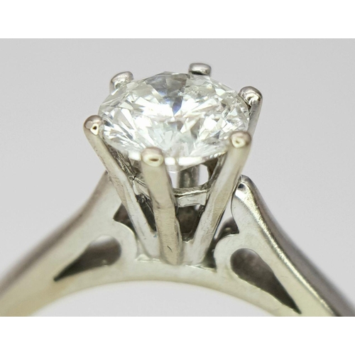 19 - A 18K WHITE GOLD DIAMOND SOLITAIRE RING 0.70CT ROUND BRILLIANT CUT IN 6 CLAW SETTING 4.3G, SIZE M 1/... 