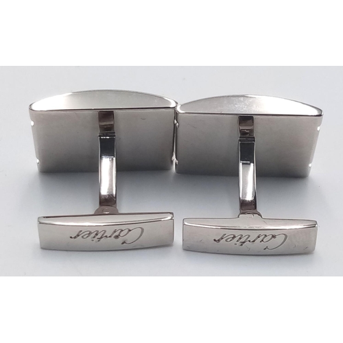 197 - A Pair of Cartier Santos 925 Silver Gents Cufflinks. Comes with original Cartier packaging. 017600