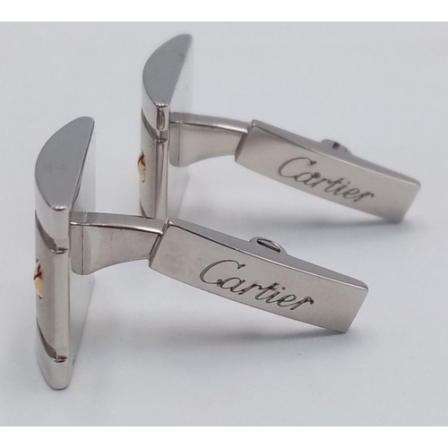 197 - A Pair of Cartier Santos 925 Silver Gents Cufflinks. Comes with original Cartier packaging. 017600