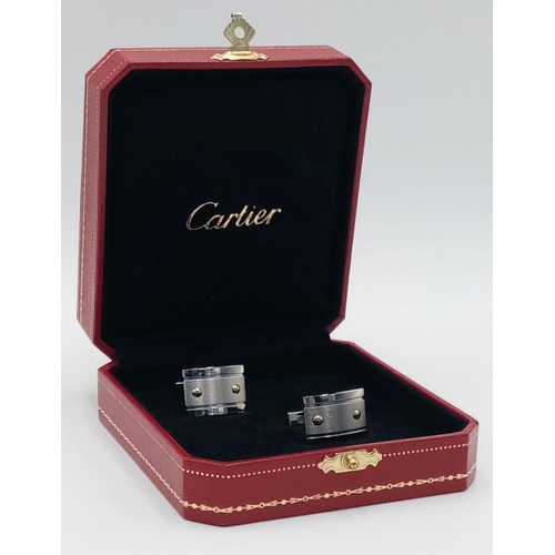 197 - A Pair of Cartier Santos 925 Silver Gents Cufflinks. Comes with original Cartier packaging. 017600