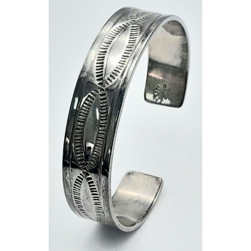 210 - SOLID SILVER CUFF BANGLE. Full UK Hallmark. Having attractive chased design. Please see pictures . 3... 