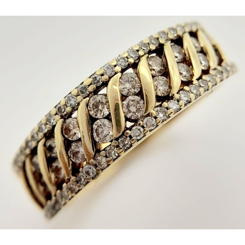 243 - A 9K YELLOW GOLD DIAMOND BAND RING 3.2G , SIZE O.

ref: SC 2006