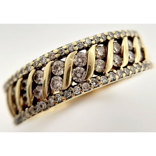 243 - A 9K YELLOW GOLD DIAMOND BAND RING 3.2G , SIZE O.

ref: SC 2006