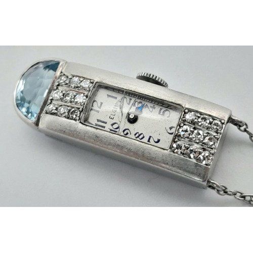 26 - A PLATINUM DIAMOND & AQUAMARINE SET PENDANT WATCH NEED SOME ATTENTION TO GLASS AND HANDS BUT WORKIMN... 