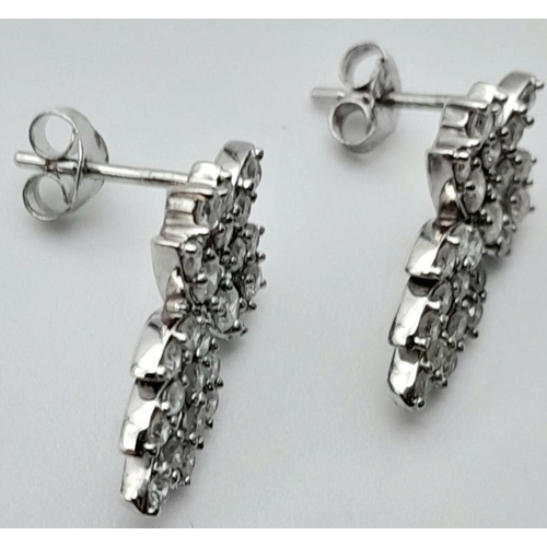 263 - A 9K WHITE GOLD DIAMOND EARRINGS 0.30CT, 2.5G TOTAL WEIGHT, 1CMx2CM.

ref: 4676