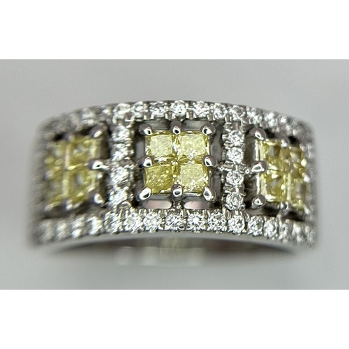 33 - A 18K WHITE GOLD VIVID YELLOW & WHITE DIAMOND RING 0.72CT OF YELOW PRINCESS CUT DIAMONDS & 0.50CT OF... 