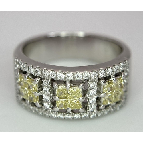 33 - A 18K WHITE GOLD VIVID YELLOW & WHITE DIAMOND RING 0.72CT OF YELOW PRINCESS CUT DIAMONDS & 0.50CT OF... 