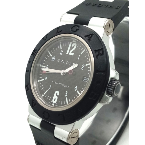 36 - A Bulgari Diagono Automatic Unisex Watch. Black rubber strap. Aluminium case - 38mm. Black dial with... 