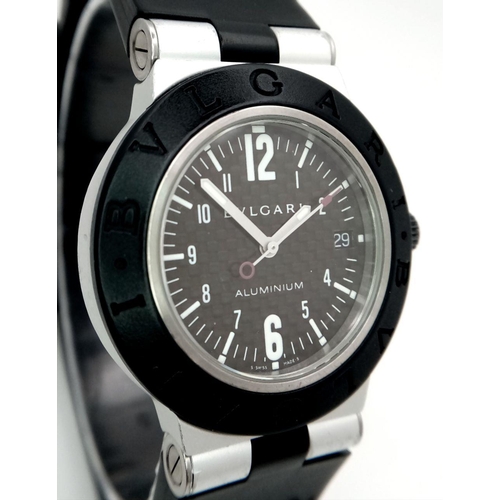 36 - A Bulgari Diagono Automatic Unisex Watch. Black rubber strap. Aluminium case - 38mm. Black dial with... 