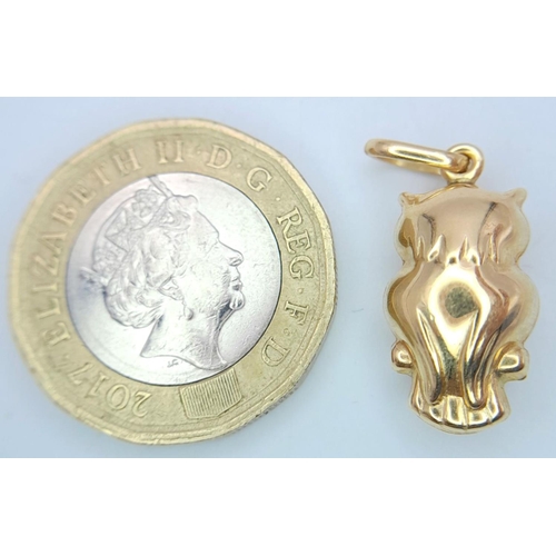 383 - A 18K Yellow Gold Owl Pendant, 1.8g total weight , 24mm x 5mm.

ref 1559I