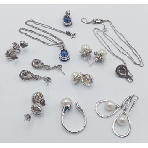 400 - An Eclectic Mix of 10 Different Silver Jewellery Items. Please see photos for finer details. 017516