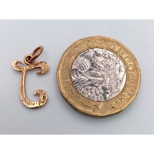 434 - 9 carat GOLD letter ‘J’ CHARM /PENDANT. 1.0 grams. 1.9 cm drop.