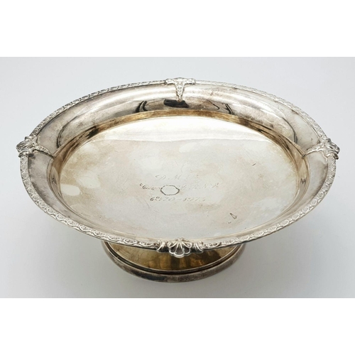 484 - A SOLID SILVER FOOTED DISH PRESENTED TO D.M.B. IN 1970  .     258.6gms    18cms DIAMETER