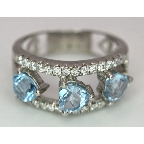 534 - A 18K WHITE GOLD DIAMOND & BLUE TOPAZ RING 0.38CT DIAMONDS & THREE HEART SHAPED TOPAZ TOTAL 1.64CT ,... 