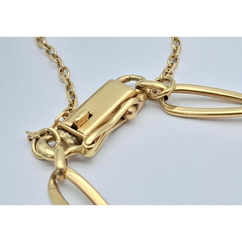 74 - A 18K (tested as) Yellow Gold Curb Bracelet with Safety Chain, 5.7g total weight, 20cm length.

ref:... 