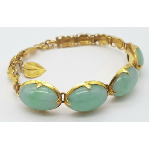 78 - A Child's 18K Yellow Gold (tested) and Jade Cabochon Bracelet. 14cm. 14g total weight.