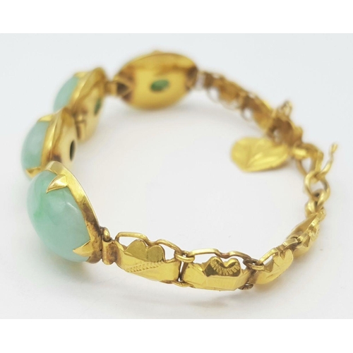 78 - A Child's 18K Yellow Gold (tested) and Jade Cabochon Bracelet. 14cm. 14g total weight.