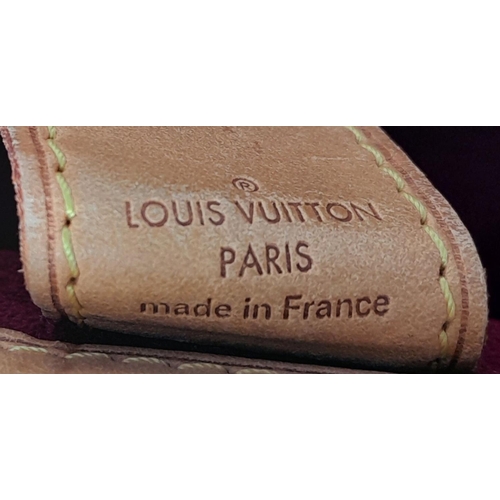 99 - A Louis Vuitton Monogram Multicolour Judy MM Bag. White Toile Canvas exterior, featuring Vachetta Co... 