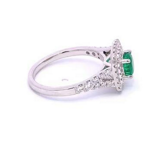 512 - Platinum EMERALD and DIAMOND ring, 0.36ct claw set round Emerald centre stone, set with 0.34ct halo ... 