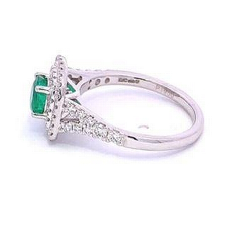 512 - Platinum EMERALD and DIAMOND ring, 0.36ct claw set round Emerald centre stone, set with 0.34ct halo ... 