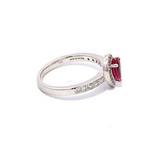 547 - 18ct white gold RUBY and DIAMOND ring, set with 0.78ct pear shaped Ruby centre, and 0.28ct surrounde... 