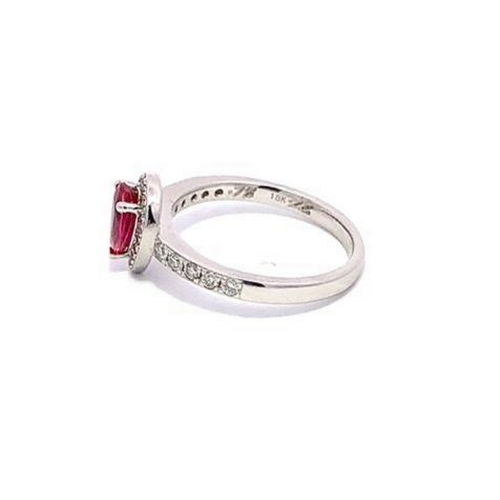 547 - 18ct white gold RUBY and DIAMOND ring, set with 0.78ct pear shaped Ruby centre, and 0.28ct surrounde... 