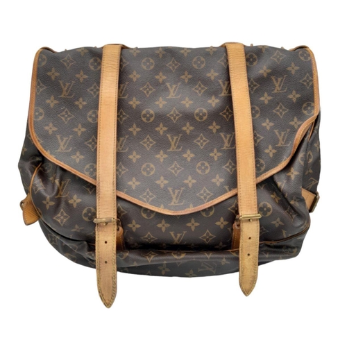 120 - A Louis Vuitton Monogram Saumur Double Strap Shoulder Bag. Brown LV monogram coated canvas exterior,... 