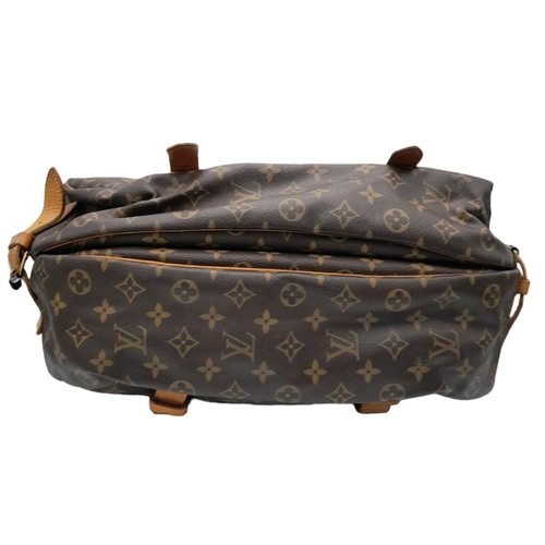 120 - A Louis Vuitton Monogram Saumur Double Strap Shoulder Bag. Brown LV monogram coated canvas exterior,... 