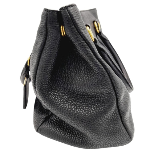 127 - A Prada Black Vitello Daino Tote Bag. Grained black leather exterior, gold-tone hardware, two rounde... 