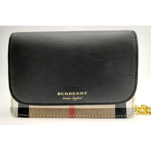 225 - A Burberry Hampshire House Check Crossbody Bag. Leather exterior and canvas lining, gold-tone hardwa... 