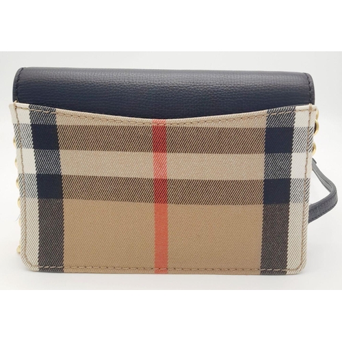 225 - A Burberry Hampshire House Check Crossbody Bag. Leather exterior and canvas lining, gold-tone hardwa... 