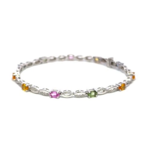 575 - 18ct white gold SAPPHIRE and DIAMOND bracelet, set with 3.38ct multi-colour oval Sapphires and 0.41c... 