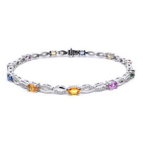 575 - 18ct white gold SAPPHIRE and DIAMOND bracelet, set with 3.38ct multi-colour oval Sapphires and 0.41c... 